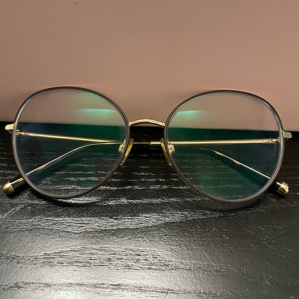 Dolce and Gabbana Round Gold Frame Glasses.